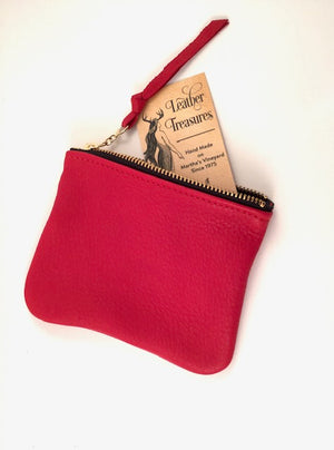 A red small leather zip pouch.
