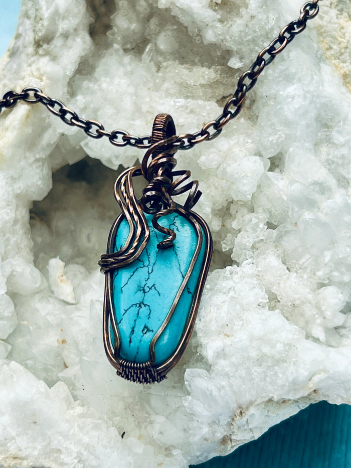Copper Wrapped Magnasite Dyed Turquoise Pendent