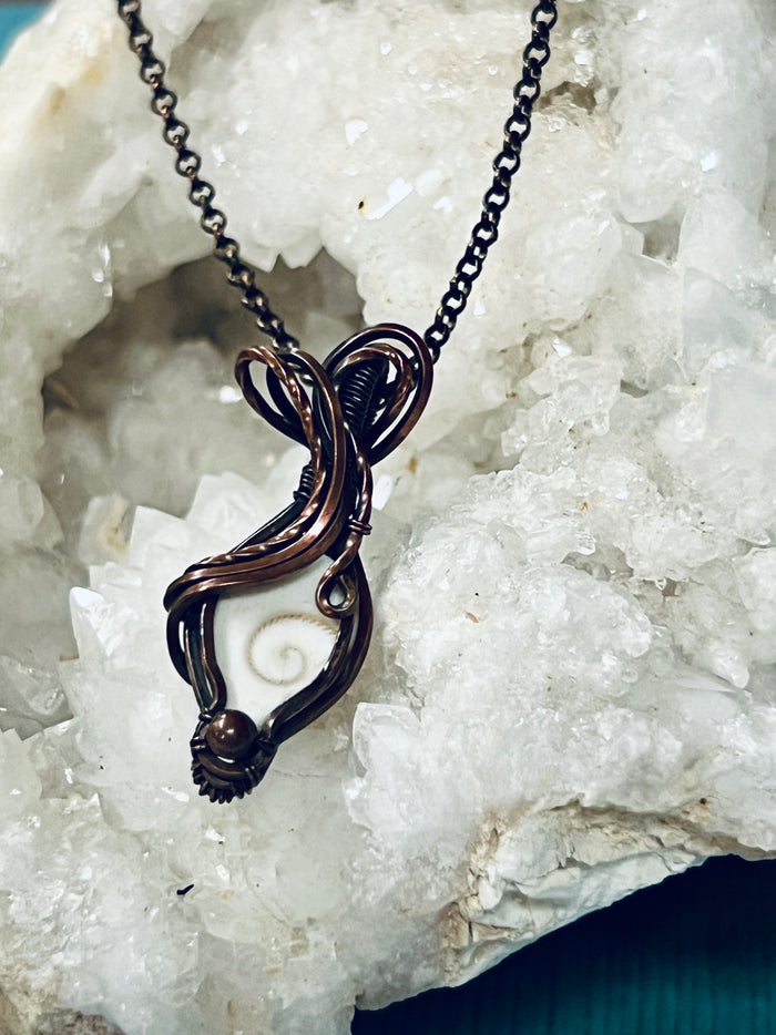 Copper Wrapped Shiva Shell Pendent