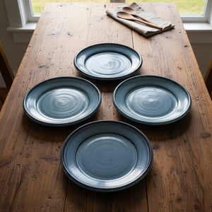 3 medium sized blue plates