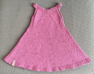 A v-neck shape pink dress that flares out.