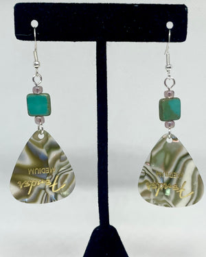 A green guitar pick earrings with turquoise square beads