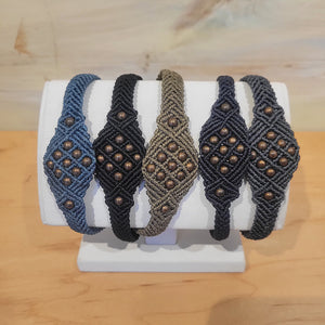 Woven macramé bracelets handmade by Rumi Sumaq. Available in four different color combinations and an adjustable tie, making it great for any size wrists. 8.5 in and smaller