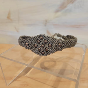 A tan woven bracelet