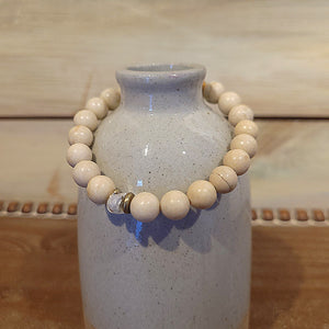 Handmade by Susan Balaban Designs, this beautiful 8 inch bracelet features white Jasper and crystals for centering and meditation.