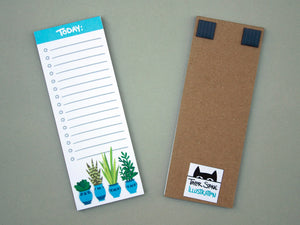 The front and back of the blue plant magnetic notepad
